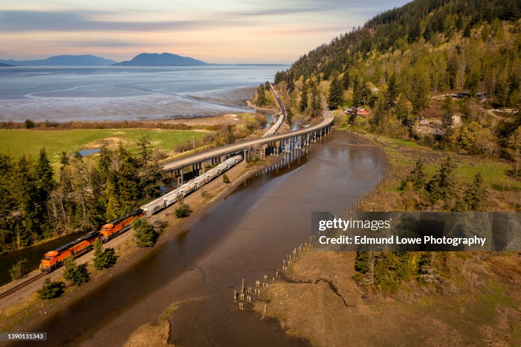 Freight Train Traveling Along Chuckanut Drive in the Town of Blanchard, Washington.