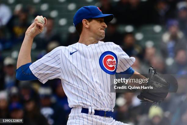 Starting pitcher Kyle Hendricks of the Chicago Cubs delivers the ball in the first inning against the Milwaukee Brewers on Opening Day at Wrigley...