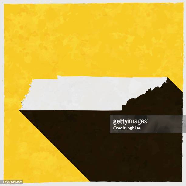 stockillustraties, clipart, cartoons en iconen met tennessee map with long shadow on textured yellow background - memphis tennessee