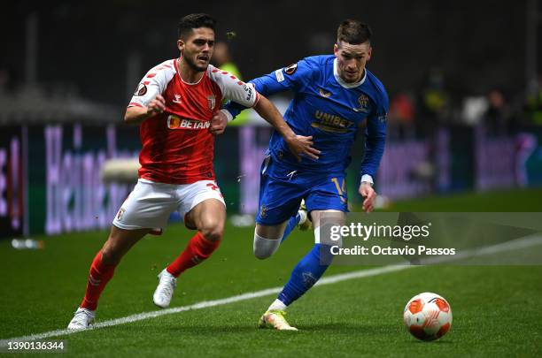 Yan Couto of Sporting Braga is challanged by r14during the UEFA Europa League Quarter Final Leg One match between Sporting Braga and Rangers FC at...