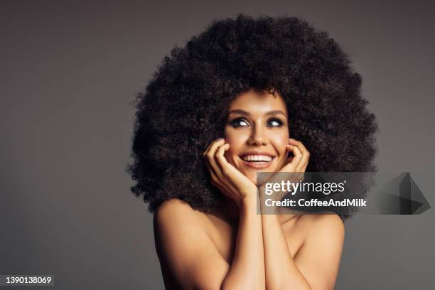 beautiful woman with afro hairstyle - black hair stock pictures, royalty-free photos & images