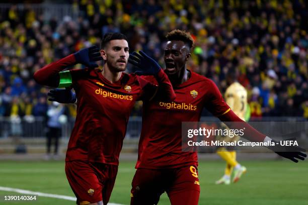 Lorenzo Pellegrini of AS Roma celebrates with team mate Tammy Abraham after scoring their sides first goal during the UEFA Conference League Quarter...
