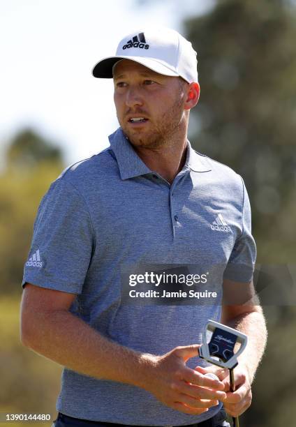 Daniel Berger looks on from the 18th green during the first round of the Masters at Augusta National Golf Club on April 07, 2022 in Augusta, Georgia.