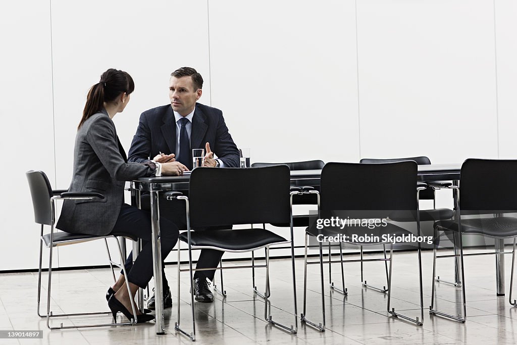 Business man and woman having a meeting