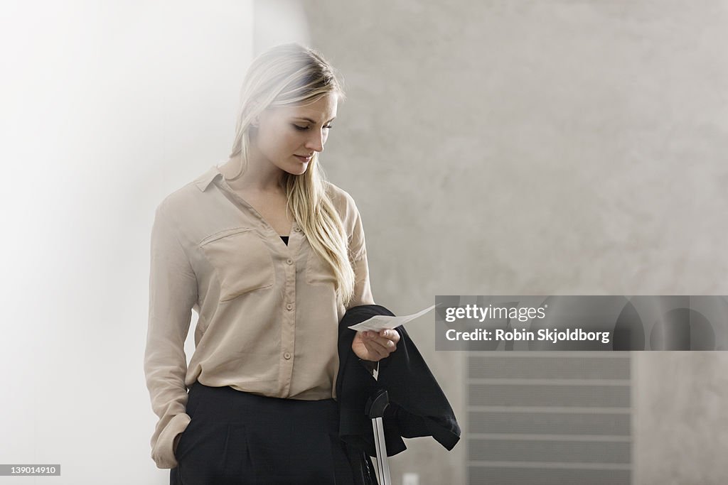 Young woman stading in hall