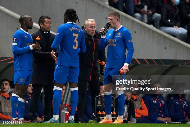 Giovanni Van Bronckhorst, Head Coach of Rangers FC gives instructions to his players during the UEFA Europa League Quarter Final Leg One match...