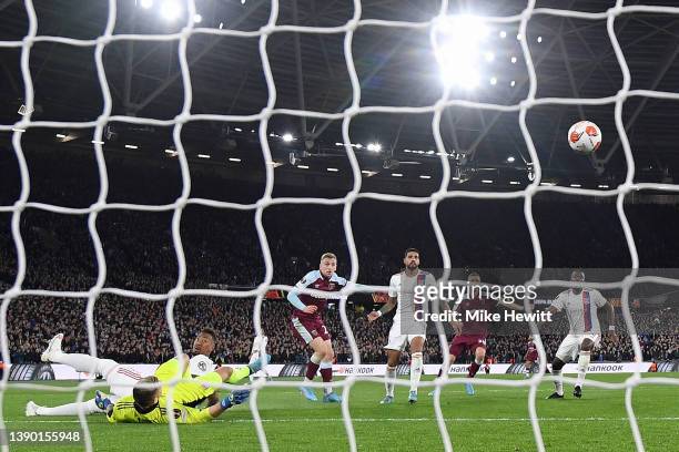 Jarrod Bowen of West Ham United scores their sides first goal during the UEFA Europa League Quarter Final Leg One match between West Ham United and...
