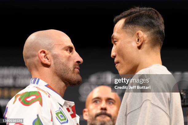 Alexander Volkanovski of Australia and Chan Sung Jung of South Korea iface off during the UFC 273 press conference on April 07, 2022 in Jacksonville,...