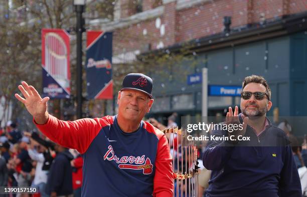 Manager Brian Snitker of the Atlanta Braves sits alongside President of Baseball Operations & General Manager Alex Anthopoulos during the Atlanta...