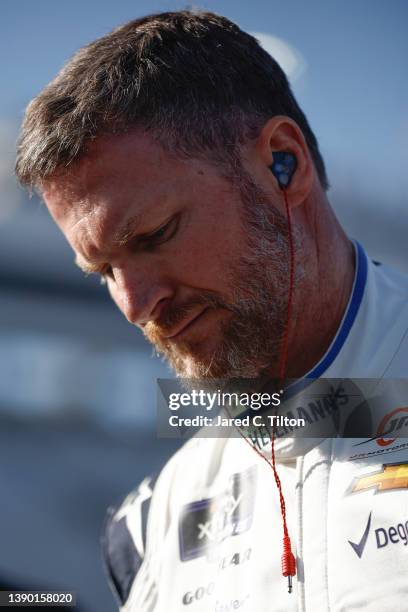 Dale Earnhardt Jr, driver of the Hellmann's Fridge Hunters Chevrolet, prepares to practice for the NASCAR Xfinity Series Call 811 Before You Dig 250...