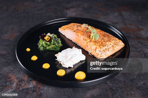 salmon steak - baked salmon stock pictures, royalty-free photos & images