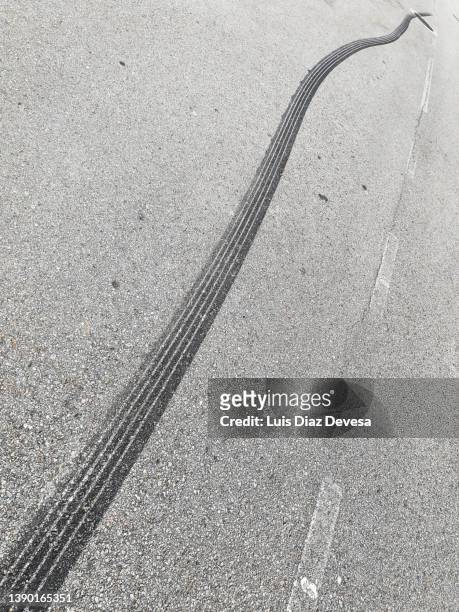 motorcycle tire marks - sked stock pictures, royalty-free photos & images