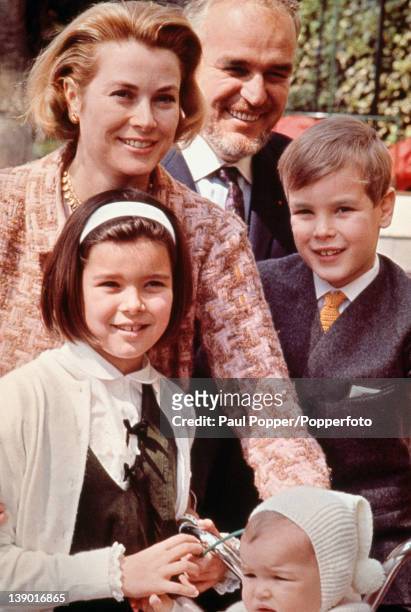 American actress Grace Kelly , now Princess Grace of Monaco, with her husband Prince Rainier III of Monaco and their children Albert, Caroline and...