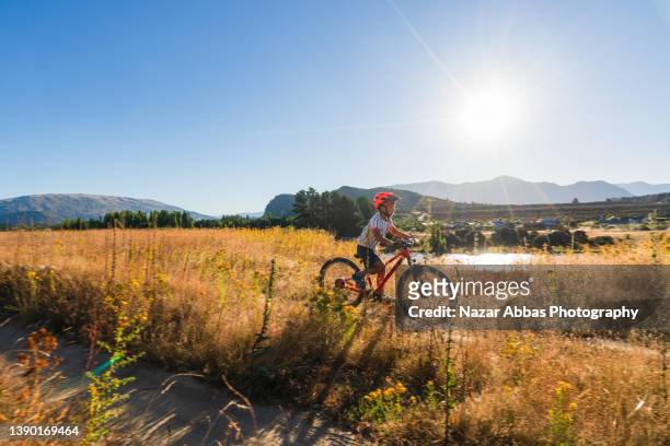 bike riding with a view. - grand 8 stock pictures, royalty-free photos & images