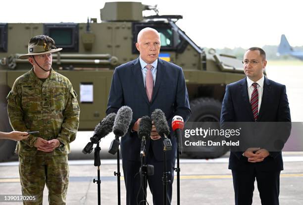 Australian Defence Minister Peter Dutton , joined by Ambassador of Ukraine to Australia Vasyl Myroshnychenko , speaks during a press conference at...