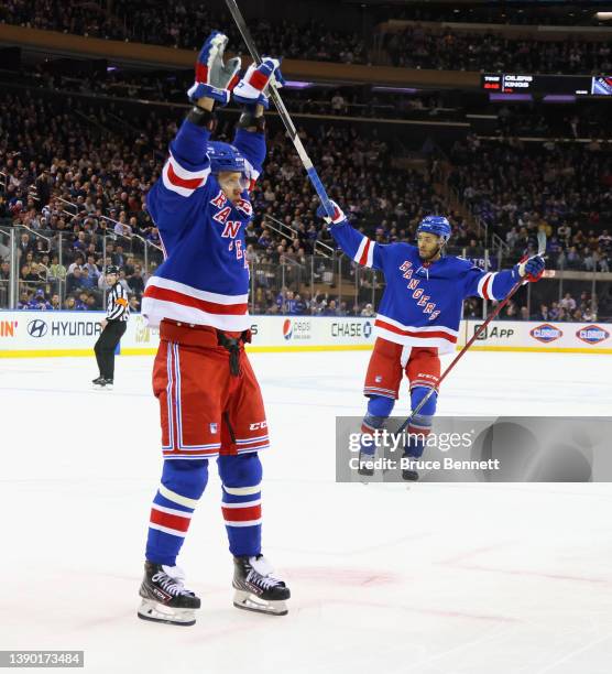 Artemi Panarin of the New York Rangers skates in his 500th NHL game and celebrates his second period goal against the Pittsburgh Penguins at Madison...