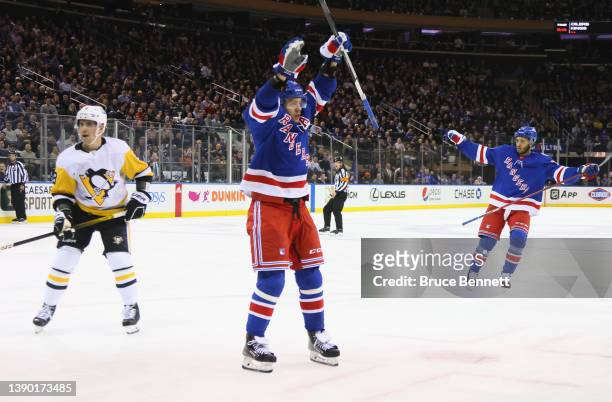 Artemi Panarin of the New York Rangers skates in his 500th NHL game and celebrates his second period goal against the Pittsburgh Penguins at Madison...
