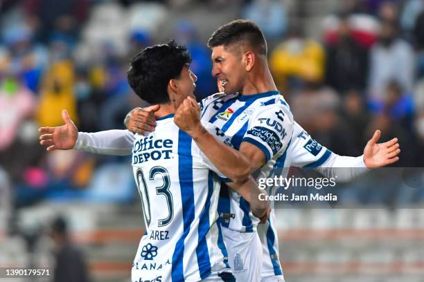 Victor Guzman of Pachuca celebrates with Kevin Alvarez after scoring his team's first goal during the 9th round match between Pachuca and Tigres UANL...