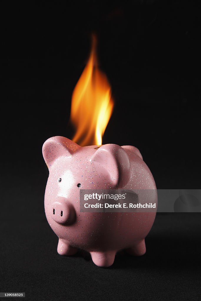 Piggybank on fire