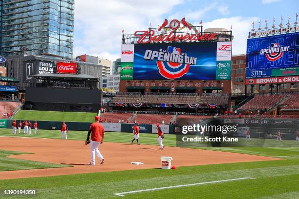 Members of the St. Louis Cardinals warmup prior to a game against the Pittsburgh Pirates on Opening Day at Busch Stadium on April 7, 2022 in St....