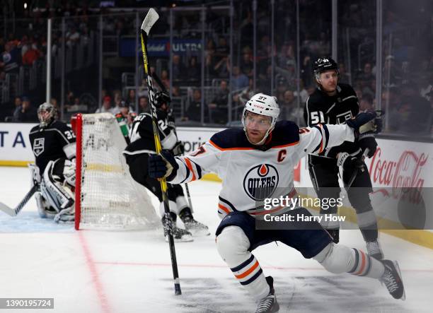 Connor McDavid of the Edmonton Oilers celebrates his goal in front of Troy Stecher, Phillip Danault and Jonathan Quick of the Los Angeles Kings, to...