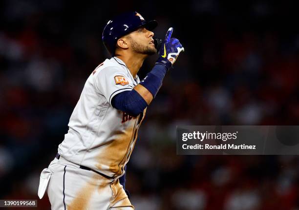 Yuli Gurriel of the Houston Astros after hitting a double against the Los Angeles Angels in the sixth inning on Opening Day at Angel Stadium of...