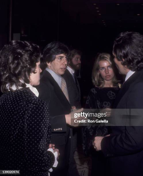 Journalists Carl Bernstein and Bob Woodward and wife Kathleen Woodward attend the premiere of "All The President's Men" on April 4, 1976 in...