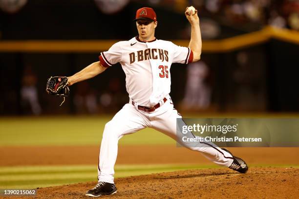 Relief pitcher Joe Mantiply of the Arizona Diamondbacks pitches against the San Diego Padres during the ninth inning of the MLB opening day game at...