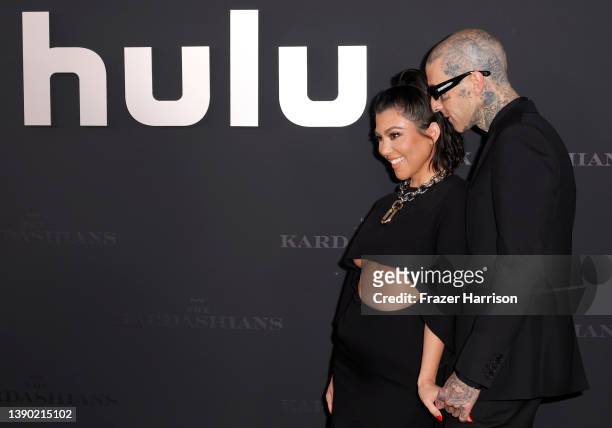 Kourtney Kardashian and Travis Barker attend the Los Angeles premiere of Hulu's new show "The Kardashians" at Goya Studios on April 07, 2022 in Los...