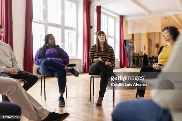 people participate in a group therapy session in the community center - promises rehab center bildbanksfoton och bilder