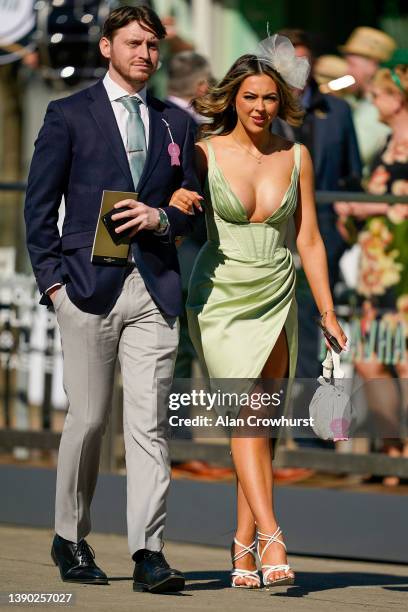 Early arrivals on 'Ladies Day' at Aintree Racecourse on April 08, 2022 in Liverpool, England.