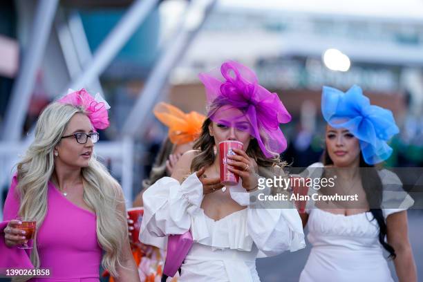 Early arrivals on 'Ladies Day' at Aintree Racecourse on April 08, 2022 in Liverpool, England.