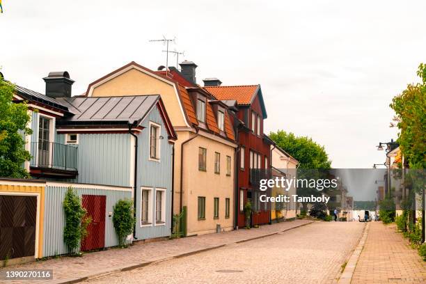 sweden, vastervik, colorful houses in old town - sweden kalmar stock pictures, royalty-free photos & images