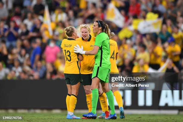 Tameka Yallop, Clare Polkinghorne and Lydia Williams of Australia celebrate victory during the International Women's match between the Australia...