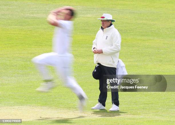 The umpire watches on as Nathan Gilchrist of Kent bowls during Day Two the LV= Insurance County Championship match between Essex and Kent at Cloudfm...