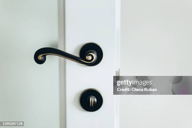 door handle and latch. - doorknob stock pictures, royalty-free photos & images