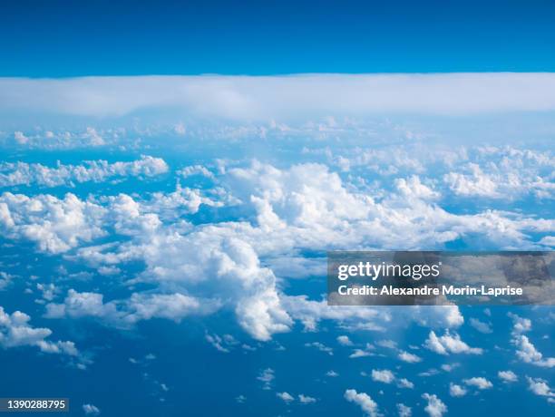 stunning cloudy blue sky high in the atmosphere - daylight saving time 2021 stock pictures, royalty-free photos & images