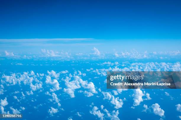 stunning cloudy blue sky high in the atmosphere - daylight saving time 2021 stock pictures, royalty-free photos & images