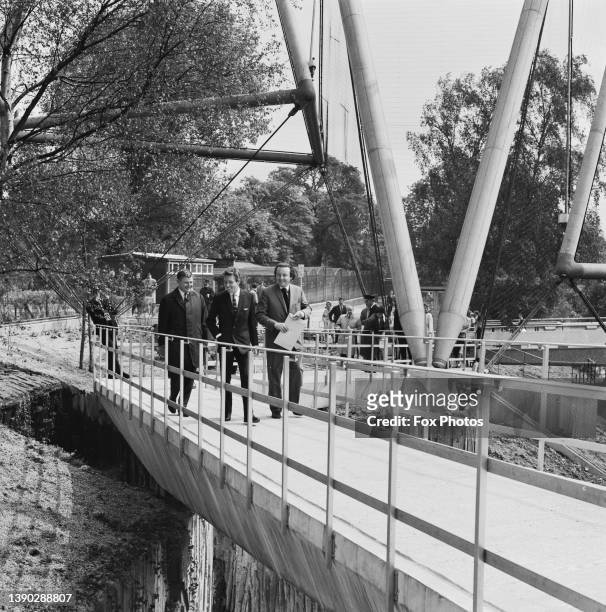 Frank Newby, Antony Armstrong-Jones, 1st Earl of Snowdon and Cedric Price in the Snowdon Aviary at London Zoo, London, 27th May 1965. The three...