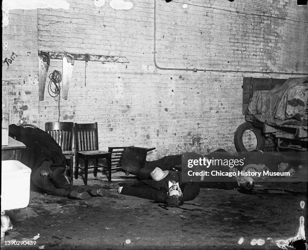 View of victims of the St Valentine's Day Massacre on the floor of SMC Cartage Company , Chicago, Illinois, mid February 1929. The massacre took...