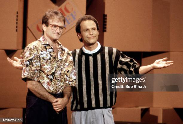 Comedians Robin Williams and Billy Crystal perform during 'Comic Relief' fundraising concert, March 29, 1986 at Universal Amphitheater in Los...