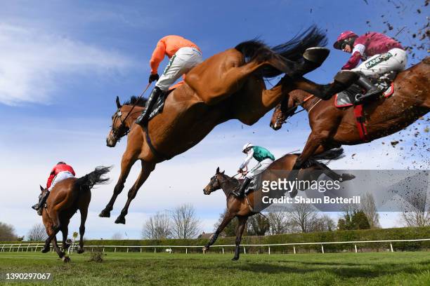 Harry Cobden on Bravemansgame clear a fence in the Betway Mildmay Novices' Chase race during Ladies' Day at Aintree Racecourse on April 08, 2022 in...
