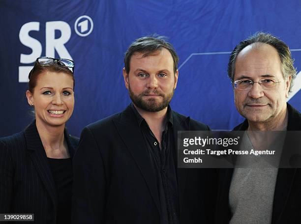 Elisabeth Brueck, Devid Striesow and Hartmut Volle attend the presententation of Devid Striesow as new Tatort Commissar at the embassy of the state...