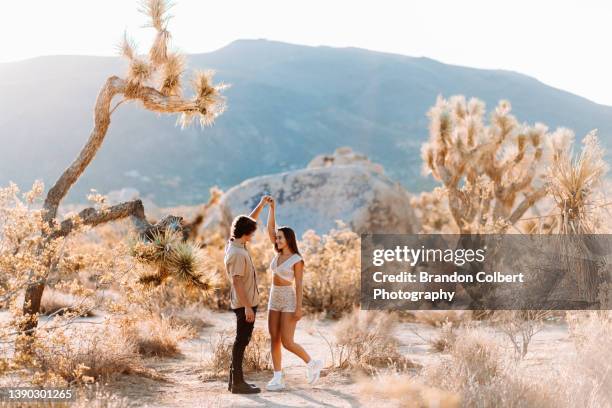 young couple embrace - josuabaum stock-fotos und bilder