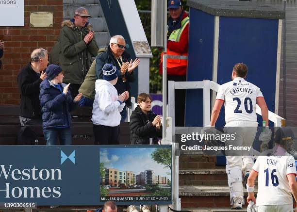 The fans applaud Matt Critchley of Essex as he walks inside after being bowled out during Day Two the LV= Insurance County Championship match between...