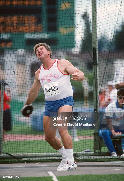 Al Oerter of the USA throws the discus during the 1989 World Veteran's Championships held during August 1989 in Hayward Field at the University of...