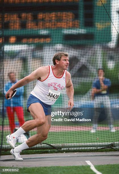 Al Oerter of the USA throws the discus during the 1989 World Veteran's Championships held during August 1989 in Hayward Field at the University of...