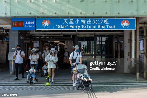 wan chai ferry pier in hong kong - baby boot stock-fotos und bilder