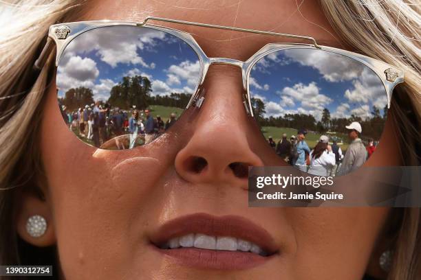 The course is seen in the reflection of a fan's sunglasses during the second round of The Masters at Augusta National Golf Club on April 08, 2022 in...