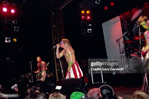 Members of American Rock group Red Hot Chili Peppers perform onstage at the Ritz, New York, New York, October 31, 1985. Pictured are, from left, Flea...